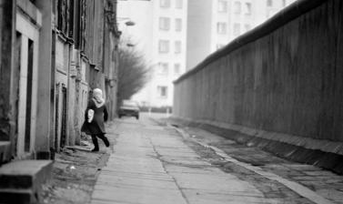 Turkish woman walking alone on an empty street